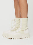 Knit & PU boots Platform base, lace fastening, rounded toe, padded footbed, treaded sole