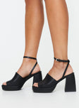 Faux leather heel Thick strap upper, ankle strap with buckle fastening, block heel