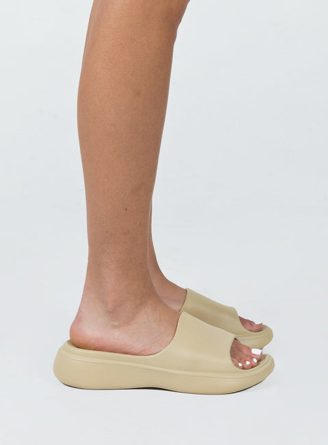 Slides Rubber design  Single wide upper  Platform base  Lightweight 