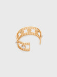 Gold-toned cuff Pearl detail, fixed shape