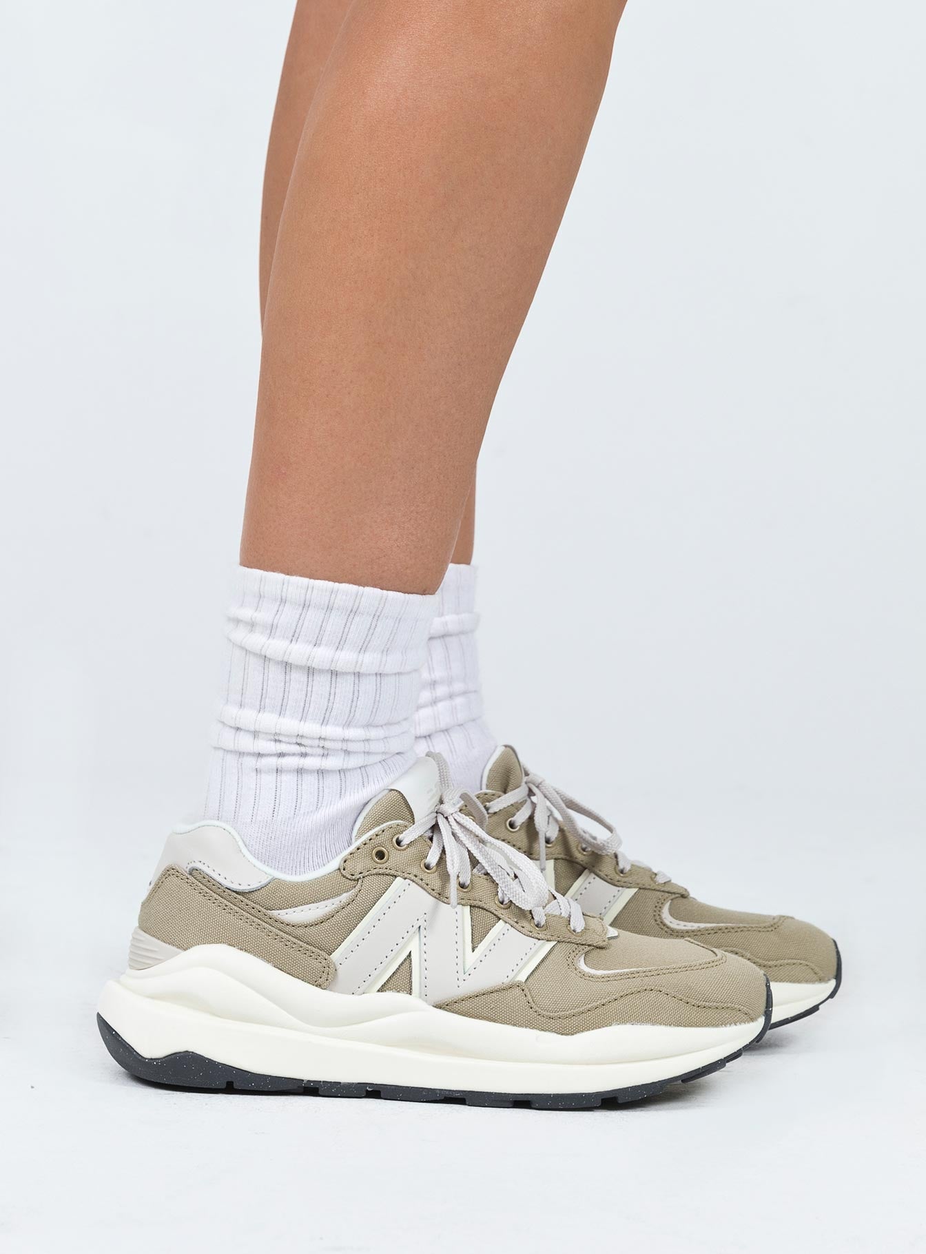 Sneakers  Lace-up style  Platform base Padded inner  Treaded sole 