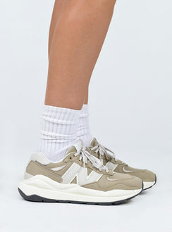 Sneakers  Lace-up style  Platform base Padded inner  Treaded sole 