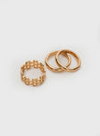 Ring Pack  Three rings, gold-toned, each ring uniquely different