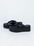 Sandals Upper & Lining: 100% PU Outsole: 100% rubber Faux leather material  Flip-flop style upper  Platform base Square toe 