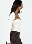 Two piece set Soft knit material Long sleeve bolero Strapless top Folded bust Good stretch
