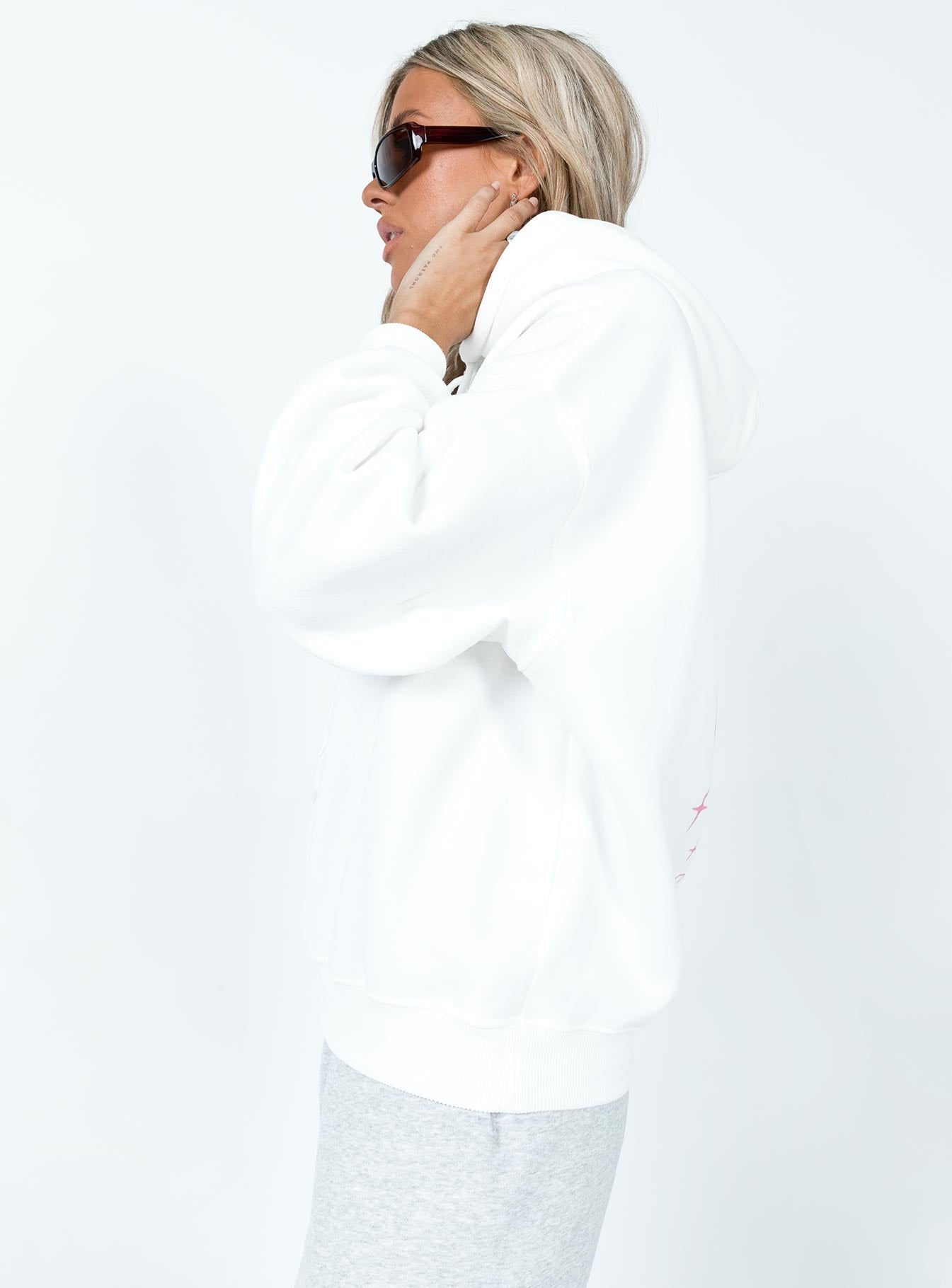 White hoodie Graphic print on back  Drawstring hood Ribbed waistband & cuffs 