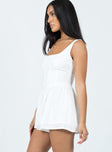 Romper Silky material  Fixed shoulder straps  Gathered waist  Twin hip pockets  Invisible zip fastening at back  Non-stretch 