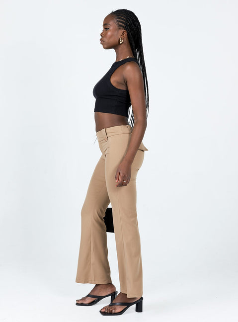 Pants Belt looped waist Zip & button fastening Faux back pockets Button detailing throughout Low waisted Slim leg Flared hem