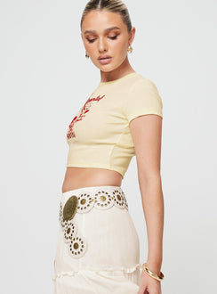    Graphic print baby tee, cap sleeves Slight stretch, unlined 