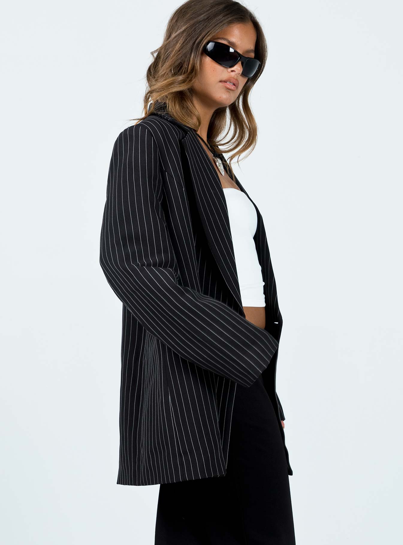 Blazer Pinstripe print Lapel collar Button fastening at front Twin hip pockets