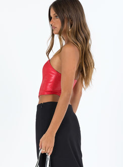 Red bustier Faux leather material Strapless design  Boning through front  Pointed hem  Zip fastening at back  Fully lined 