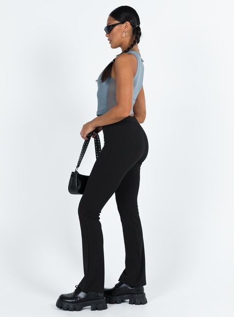Black slim fitting pants High rise Zip and button fastening Invisible zip at cuff Good stretch