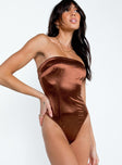 Brown strapless bodysuit Silky material  Inner silicone strip at bust  Invisible zip fastening at back  High cut leg  Cheeky cut bottom  Press clip fastening at base 