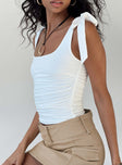 White top Adjustable shoulder straps with tie fastening Scooped neckline Ruching at sides Good stretch Fully lined