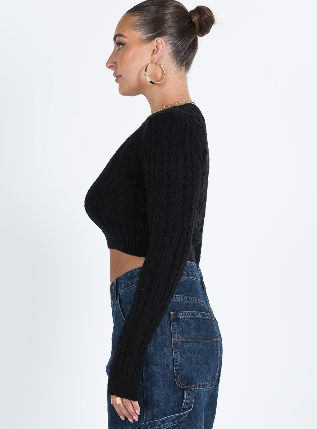 Cropped sweater Knit material Crew neckline Good stretch  Unlined 