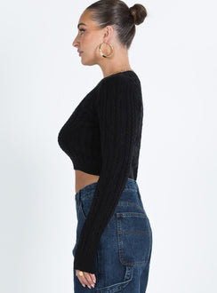 Cropped sweater Knit material Crew neckline Good stretch  Unlined 