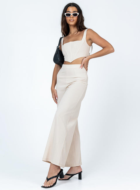 Matching set Silky material  Corset top  Boning through front  Zip fastening at back  High waisted pants  Invisible zip fastening at side  Wide leg 