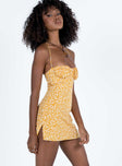 Yellow mini dress Floral print Halter neck tie fastening Wired cups Ruched bust Invisible zip fastening at back