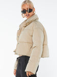 Cropped puffer jacket High neckline, zip and press button fastening at front, twin hip pockets, drawstring waist