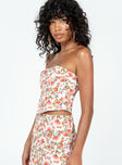 Strapless top Floral print  Inner silicone strip at bust  Zip fastening at back  Curved Hem