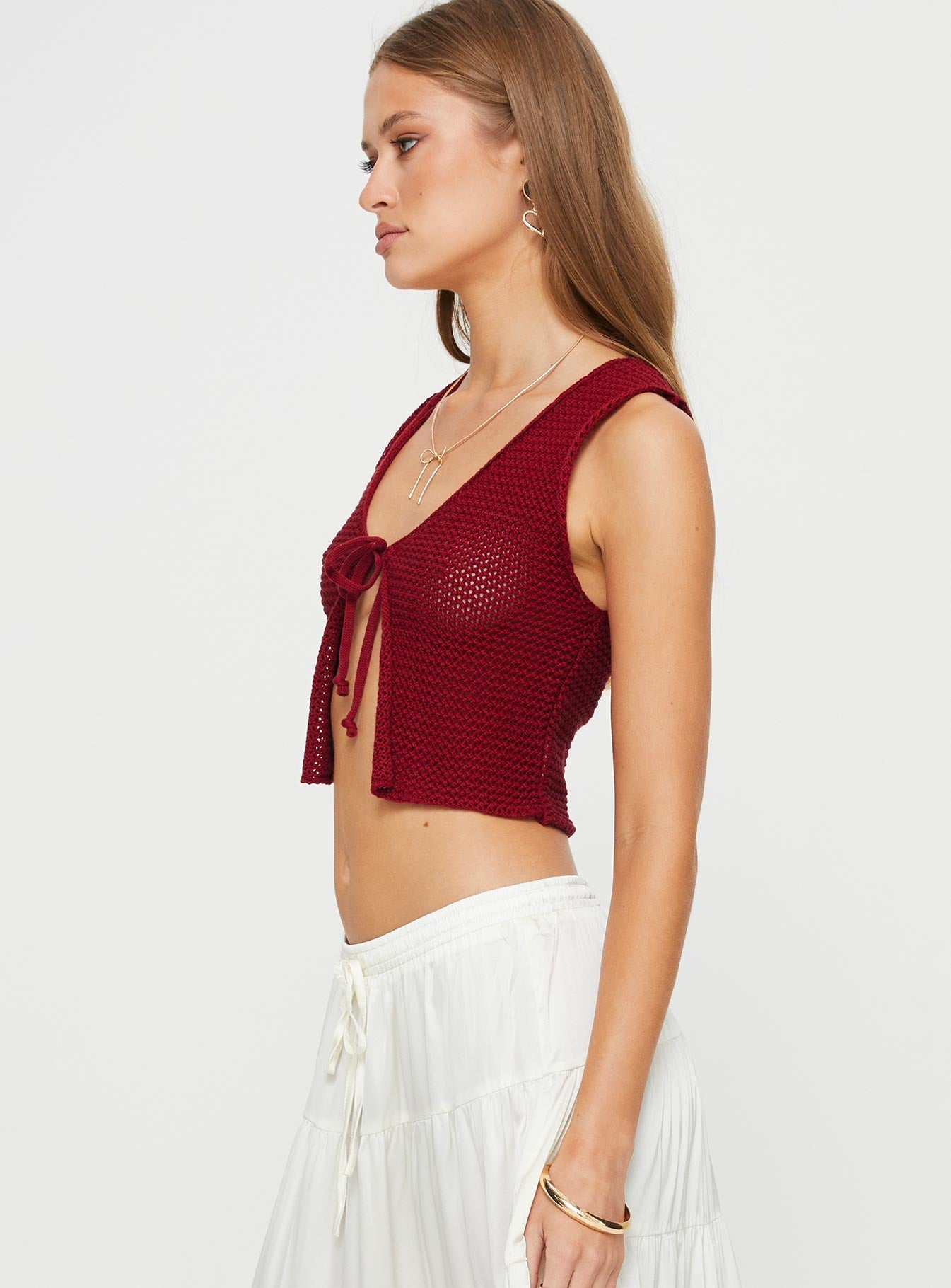 Knit top V-neckline, tie fastening at bust