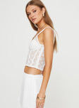 Lace crop top Fixed shoulder straps, v-neckline, boning throughout, zip fastening at back Good stretch, unlined 
