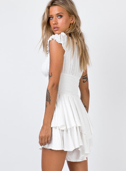 Playsuit Can be worn on or off the shoulder Soft textured material Shirred waistband Ruffle detailing Elasticated neck and sleeves Fully lined