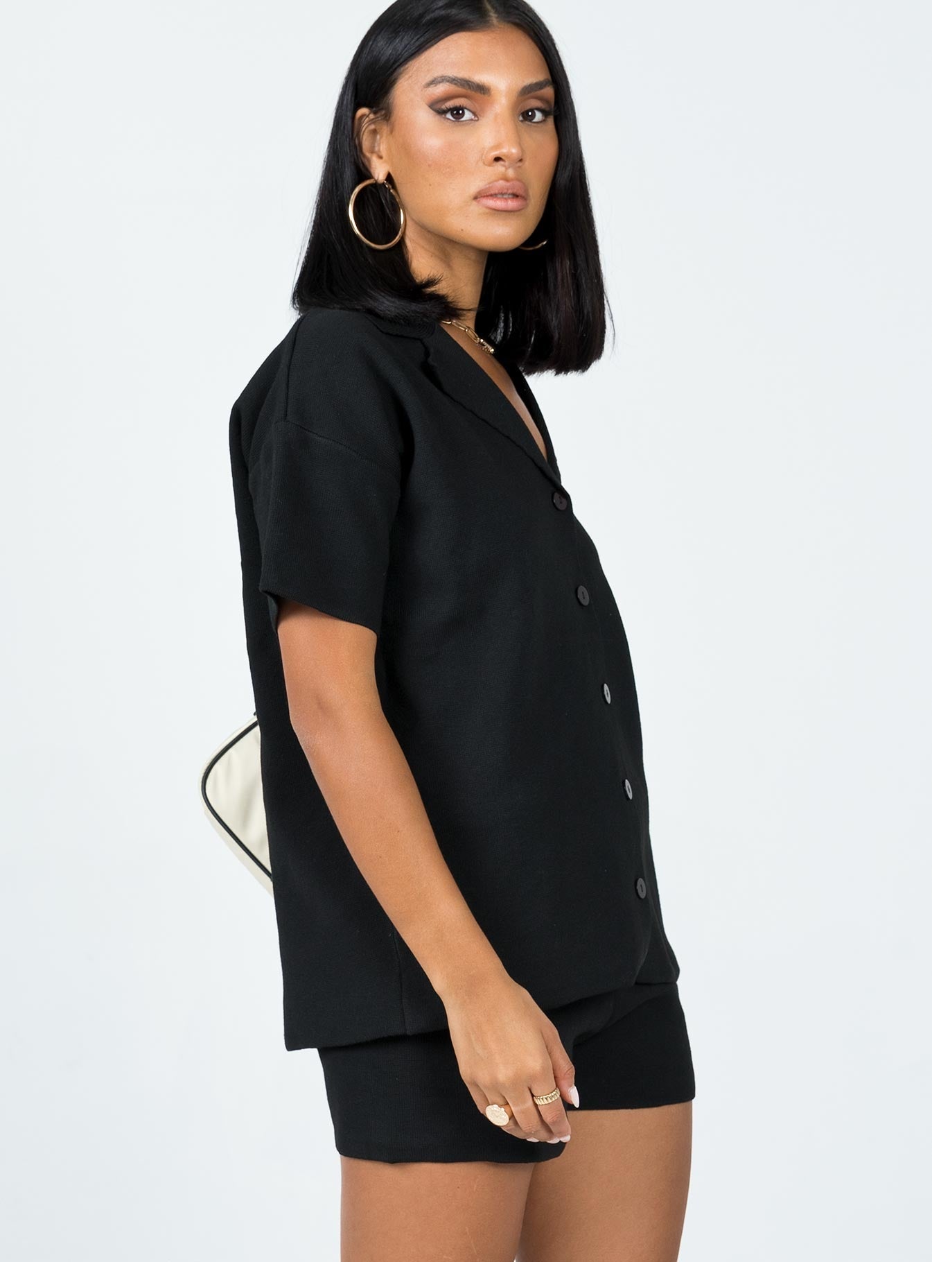 Matching set  Relaxed fit  Princess Polly Exclusive 63% recycled fibers 25% polyester 12% nylon  Soft knit material  V neckline  Button front fastening  High waisted shorts  Elasticated waistband 