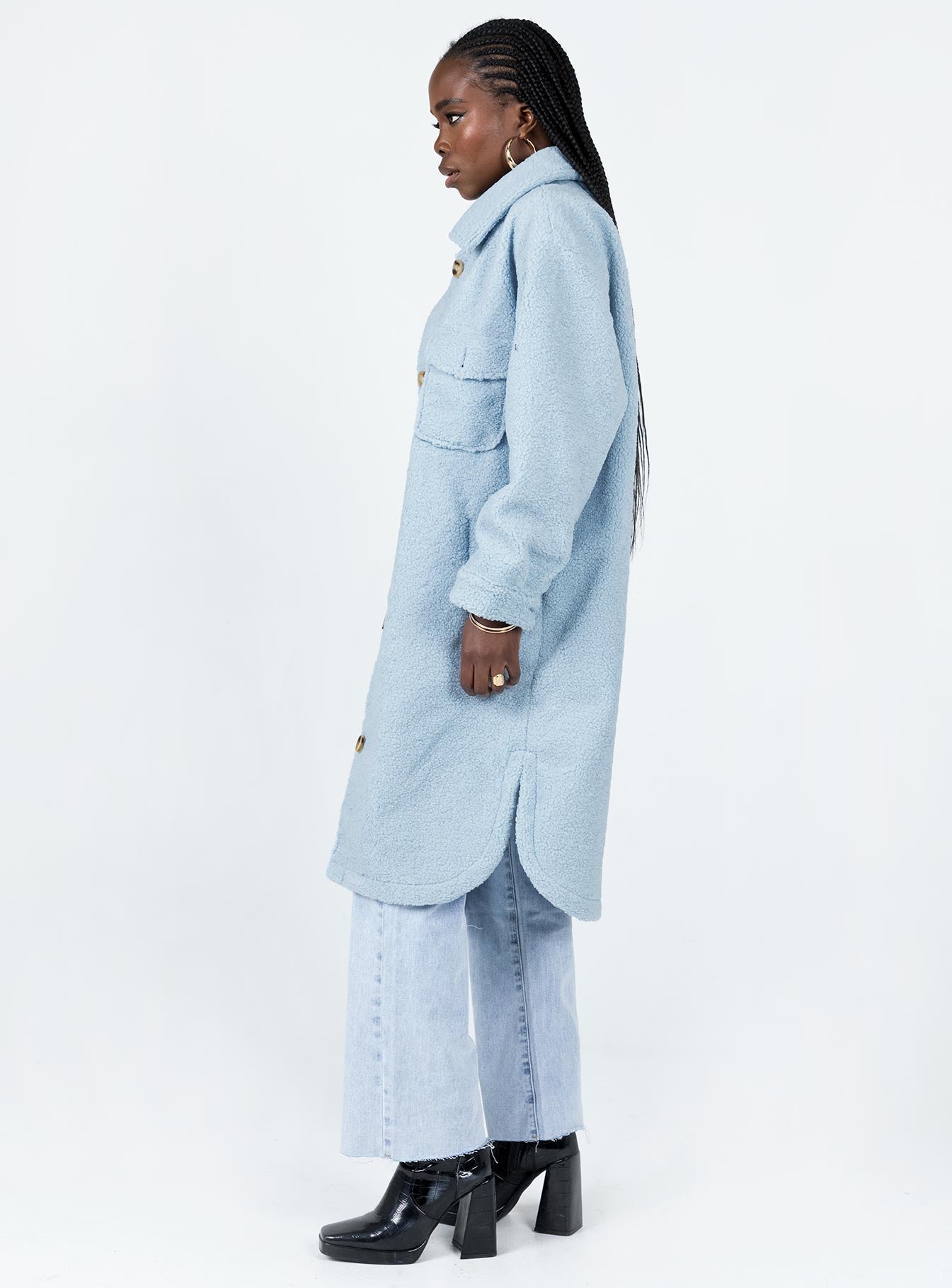 Oversized jacket Faux fur material  Classic collar Button front fastening  Twin hip pockets 