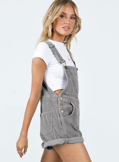 Overalls Corduroy material Adjustable buckle straps Button fastening at sides Large chest pocket Classic four pockets  Gold-toned hardware  Fixed rolled hem