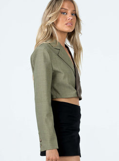 Cropped blazer Two-toned design Lapel collar Button fastening at front Single chest pocket Faux buttons at cuff