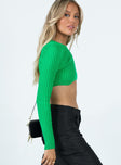 Long sleeve top Ribbed material  Scooped hem 