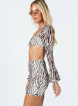 Matching set  Slim fitting  Princess Polly Exclusive 95% polyester 5% elastane  Length of size US 4 / AU 8 waist to hem: 43cm / 16.9"   Zebra print  Mesh material  Long sleeve crop top  Wired cups  High waisted mini skirt  Elasticated waistband 