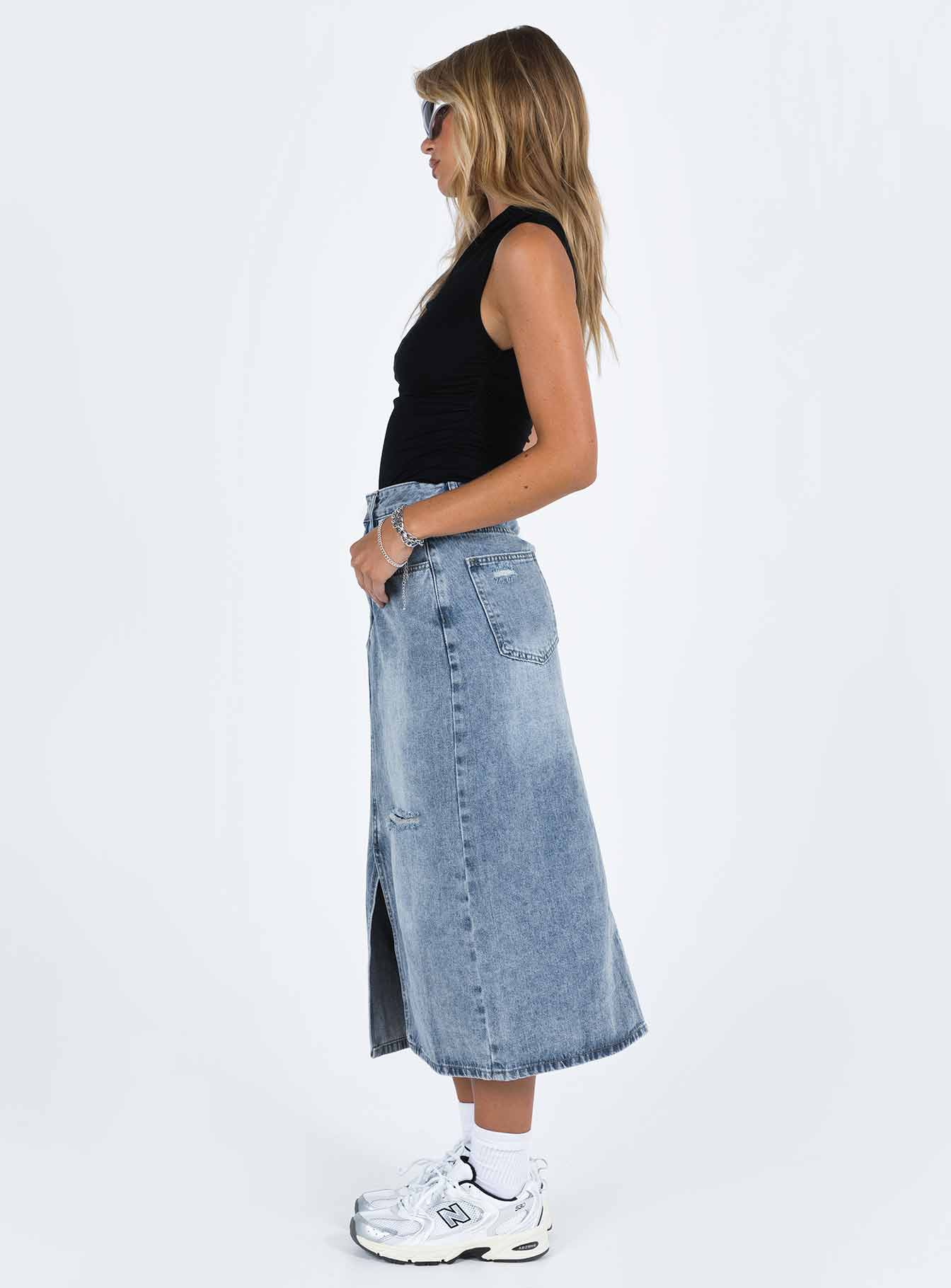 Midi skirt Light wash denim  Belt looped waist Zip and button fastening  Classic five pocket design Distressed detail Spilt hem