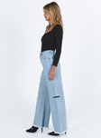 Wide leg jeans Mid wash denim Front button and zip fastening Belt looped waist Twin hip pockets Faux back pockets Ripped leg Frayed hem
