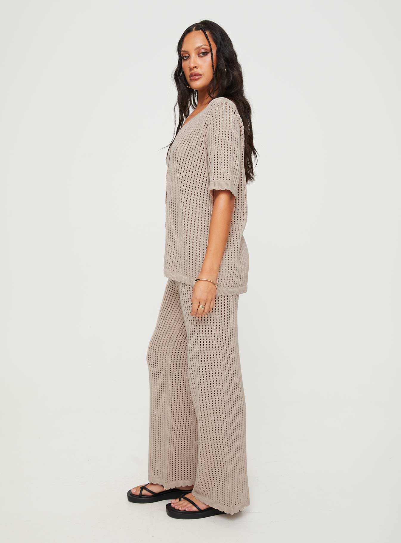 Crochet matching set  Button up shirt, v-neckline, button fastening at front, drop shoulder  High rise pants, thick elasticated waistband, straight leg
