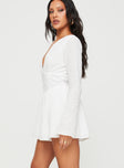Long sleeve romper V neckline, flared sleeves, invisible zip fastening at back Non-stretch material, fully lined 