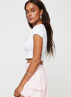 Graphic baby tee Cap sleeve Good stretch, unlined 