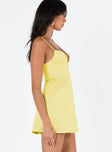Yellow mini dress Silky material Pleated bust detailing with V neckline Boning through bodice Adjustable straps Invisible zip fastening at back