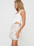Floral print mini skirt Mid rise, tiered design, invisible zip fastening at side