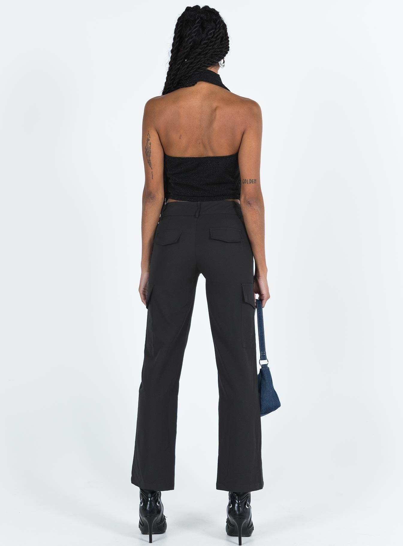 Black cargo pants High rise Belt looped waist Zip and button fastening Faux back pockets Twin leg pockets Straight leg