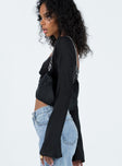 Long sleeve top Lame material Sweetheart neckline Zip fastening at back Tie fastening at back