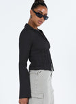 Shirt V neckline Classic collar Slight ruching at bust Button fastening at front Knitted lace detail Flared cuff