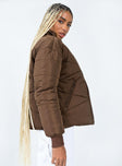 Puffer jacket  100% polyester  High neck  Zip front fastening  Twin zip pockets  Ribbed cuffs  Fully lined 