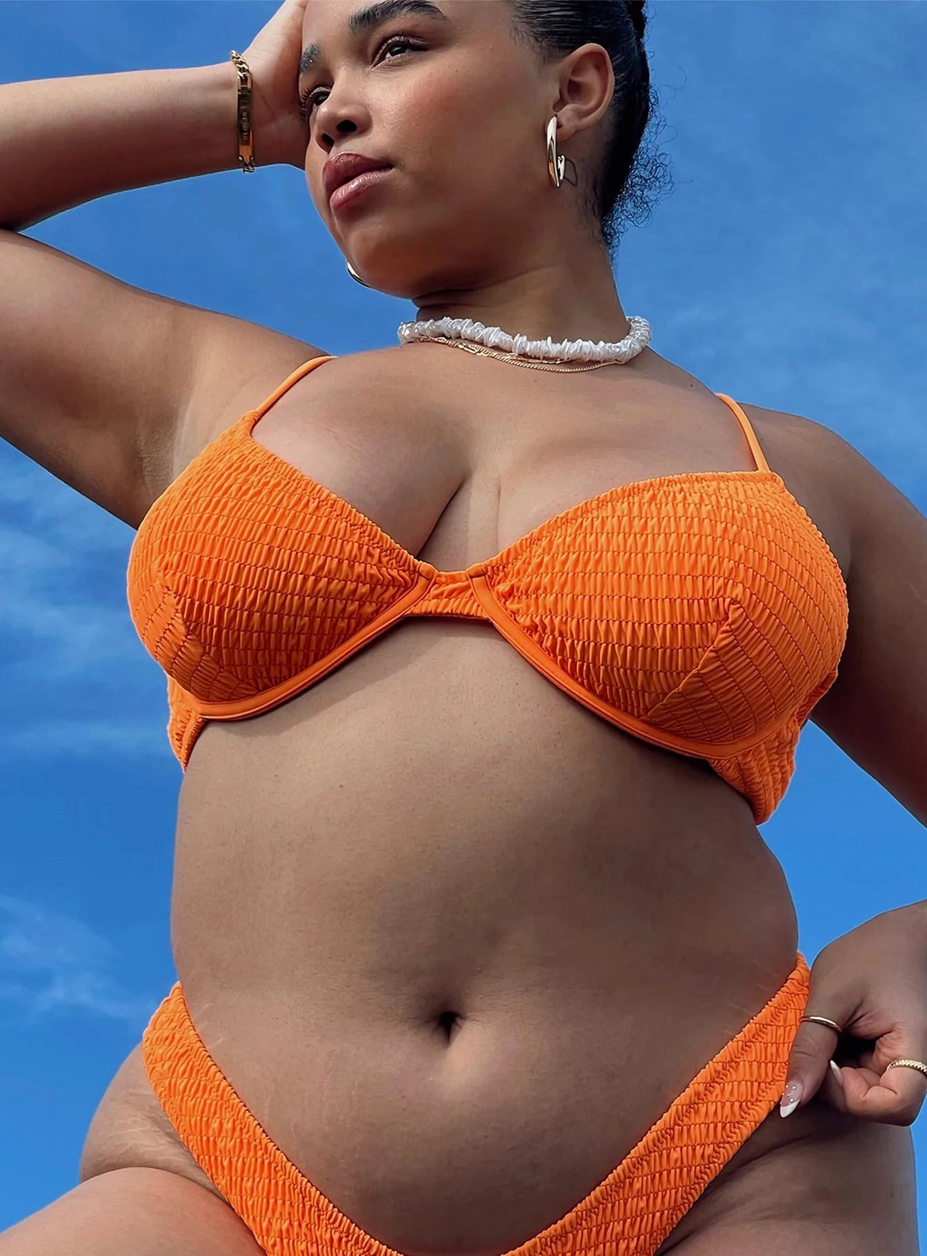 Bikini top Shirred design Wired cups Adjustable shoulder straps Clasp fastening Padded cups Fully lined