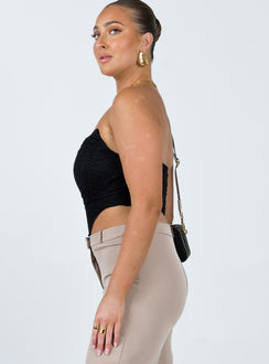 Bustier Lace material Inner silicone strip at bust Boning throughout Zip fastening at back