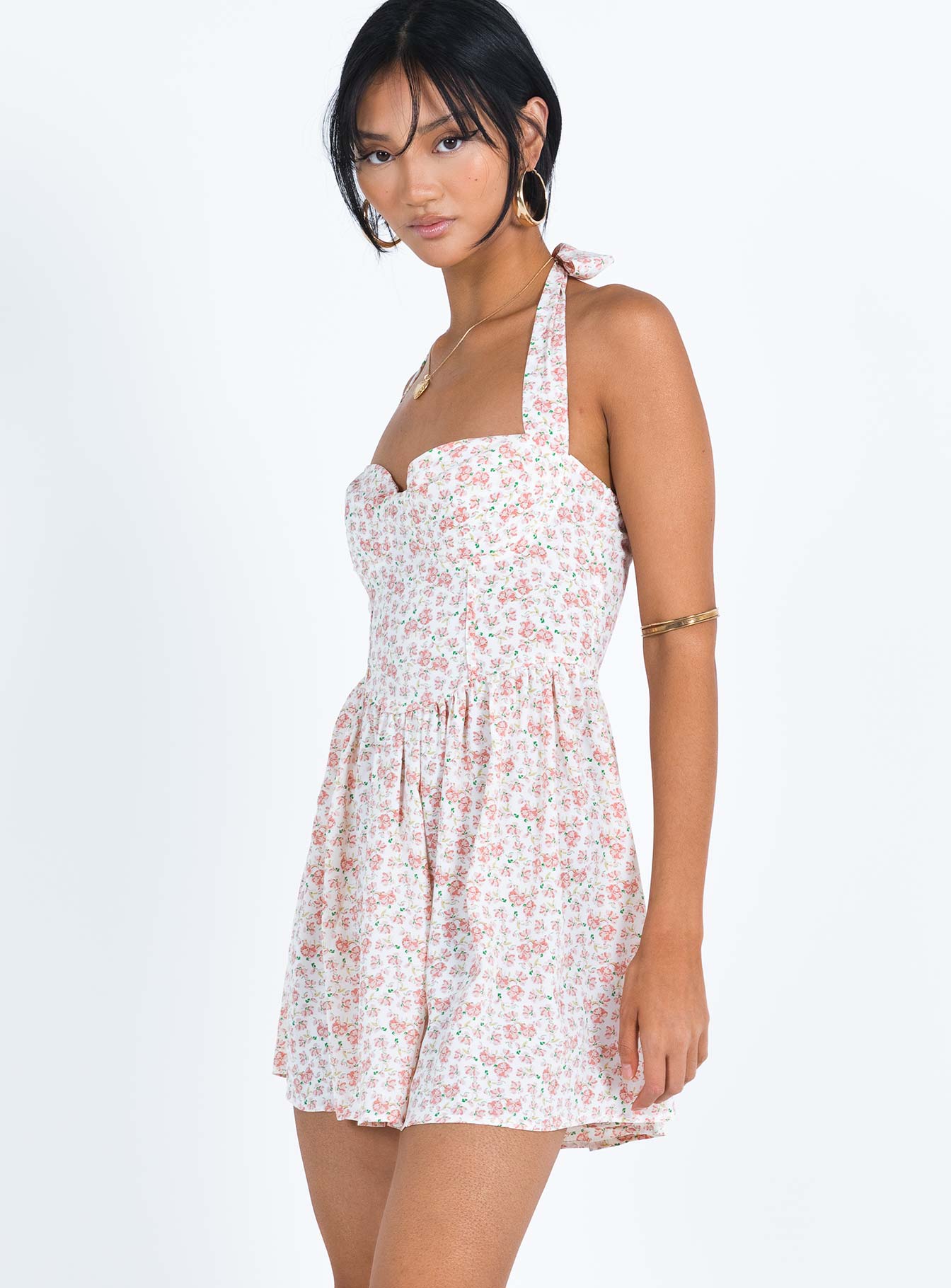 Mini dress Floral print Halter neck tie fastening Invisible zip fastening at back Slight rushing at waist