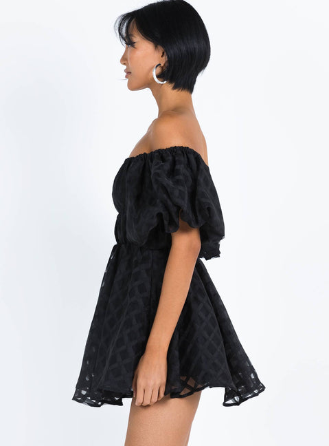 Black mini dress Sheer material Off the shoulder design Puff sleeve Elasticated bands at waist