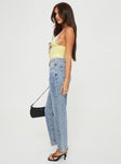 Mid rise denim jeans Asymmetrical waistband, relaxed straight leg, button front fastening, belt loops at waist, distressed detailing on hem