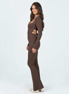 Long sleeve jumpsuit Ribbed material Square neckline Cut out at back with tie fastening Good stretch Partially lined